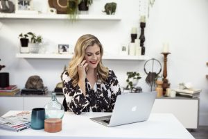 Business woman sitting with computer